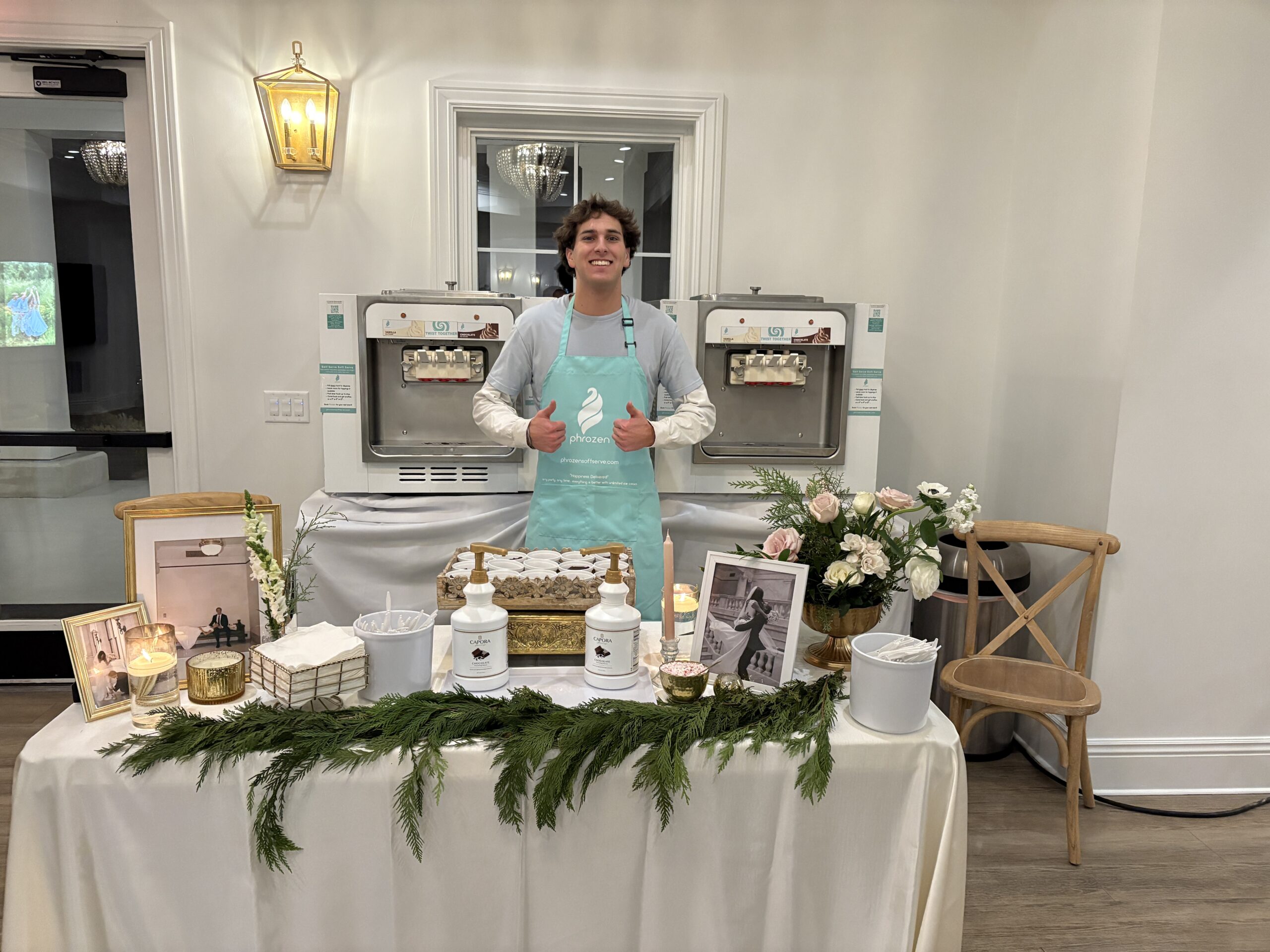 Phrozen server in front of two ice cream machines